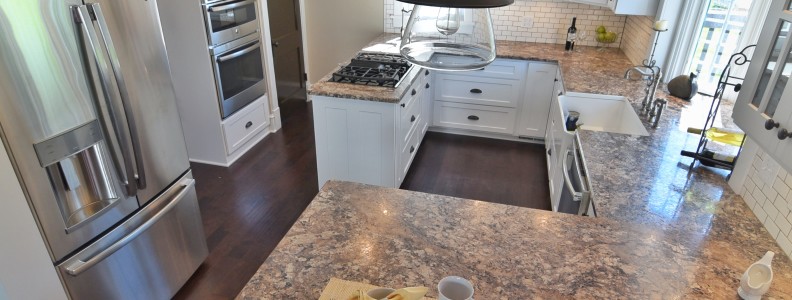 Hardwood floors, High end laminate counter tops, Custom Backsplash, Edison bulbs, retro fixtures, Under mount Farm Style Sink, Custom Cabinetry, Glass paneled cabinet doors, Prep Sink, Built in fridge, under cabinet lighting, bay window, built in cook top, refinished hardwood flooring, custom bathroom sink, half bath, new toilet