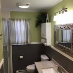 Bathroom make-over with satin nickel faucets, custom vanity and vanity top